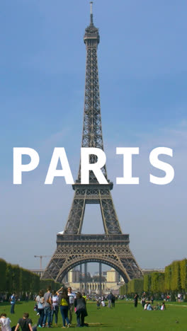 Vertical-Video-Of-Eiffel-Tower-With-Tourists-In-France-Overlaid-With-Animated-Graphic-Spelling-Out-Paris